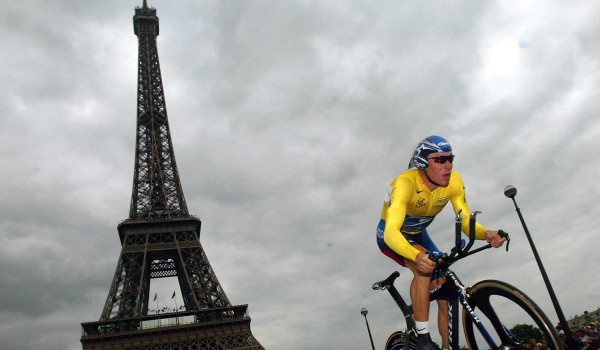 Lance Armstrong has announced he will stop fighting a barrage of drug charges from the US Anti-Doping Agency (USADA), putting at risk his unparalleled string of seven Tour de France titles and his legacy as one of the greatest sportsmen in history. Armstrong's declaration on Thursday night sets up a likely lifetime ban from the sport and the possibility that he will be stripped of his signature achievement the extraordinary run of Tour titles he won from 1999 to 2005. File photo : Lance Armstrong of Team US Postal Service, who has already won the tour for four times, approaches the first metres of the prologue of the Tour de France in Paris near the Eiffel Tower on July 5, 2003. Photo by Gero Breloer/DPA/ABACAPRESS.COM # 250546_001