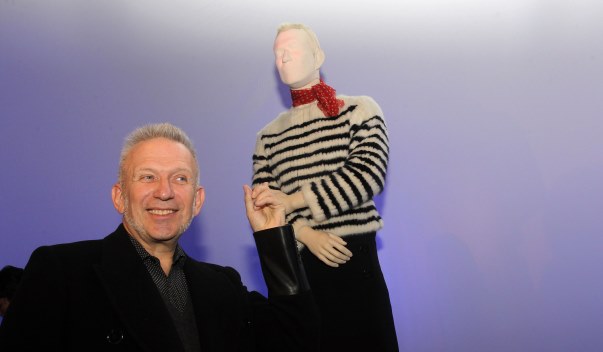 French fashion designer Jean-Paul Gaultier poses in front of a life-size mannequin of himself and some his creations during a press preview of 'The Fashion World of Jean-Paul Gaultier: From Sidewalk to Catwalk' exhibition at the Brooklyn Museum in New York on October 23, 2013. The exhibition, which features life-size mannequins with video-animated faces run from October 25, 2013 to February 23, 2014. Photo by Charles Guerin/ABACAPRESS.COM