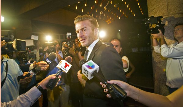 Soccer star and future MLS team owner David Beckham arrives for a festive event at the Knight Concert Hall at the Adrienne Arsht Center on Tuesday Feb. 4, 2014, in Miami. (Patrick Farrell/Miami Herald/MCT)