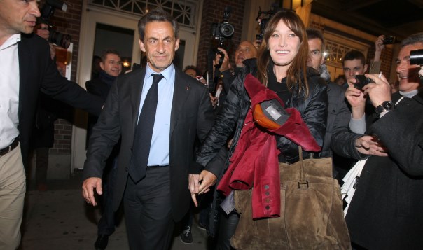 Carla Bruni with her husband former French President Nicolas Sarkozy are leaving together The Town Hall where Carla Bruni performed a concert in New York, NY on April 24, 2014. Photo by Charles Guerin-Morgan Dessalles/ABACAUSA.COM