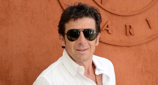 Patrick Bruel stopping by the Village, the VIP quarter of the French Tennis Open 2014 at Roland Garros arena in Paris, France, on June 8, 2014, Photo by Nicolas Briquet/ABACAPRESS.COM