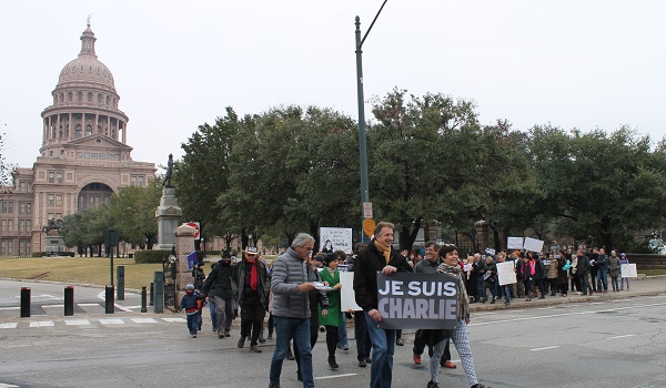 After printing a Je suis Charlie sign, Serge and Ika Dacic led the march.