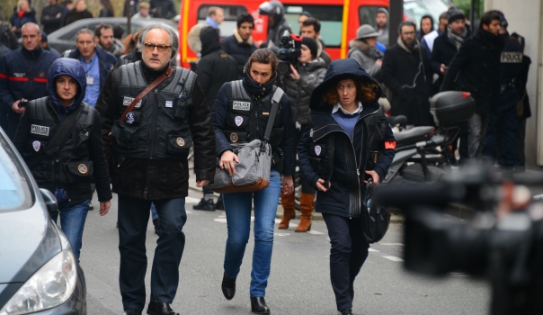 Atmosphere at the shooting scene outside the Paris offices of satirical weekly Charlie Hebdo, in Paris, France on December 6, 2015. At least 11 people were killed - including two police officers - and 5 injured when two heavily armed gunmen stormed the offices. The magazine is most famous internationally for publishing a controversial series of cartoons depicting the Prophet Mohammed in 2012. Photo by Nicolas Briquet/ABACAPRESS.COM