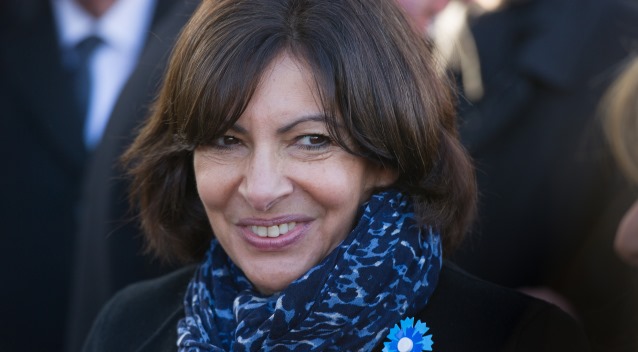 Paris mayor Anne Hidalgo during a wreath laying ceremony at the statue of the late French statesman Georges Cemenceau as part of the Armistice Day celebrations, in Paris, France on November 11, 2014. Photo Pool by Witt-Chamussy/ABACAPRESS.COM