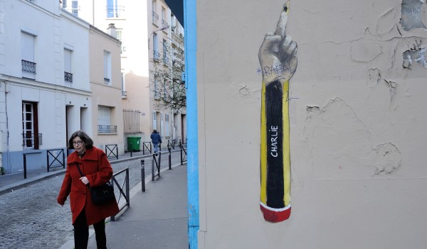 Street art, graffiti by artist Philippe Herard in the streets of Paris, France, on January 24, 2015, days after the shooting in the offices of Charlie Hebdo where12 people were killed, including cartoonists Charb, Wolinski, Cabu and Tignous and deputy chief editor Bernard Maris which took place on January 7, 2015. Photo by Aurore Marechal/ABACAPRESS.COM