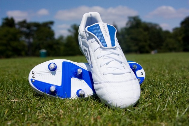 sport-grass-football-team-park-field-shoes-boots_121-19448