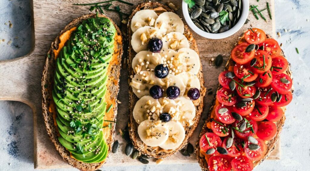 Bread toasts with avocado, banana, tomato. Easy to make, great for a quick breakfast.