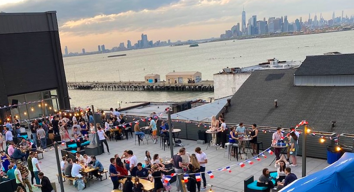 A French member on a rooftop on July 13 in New York